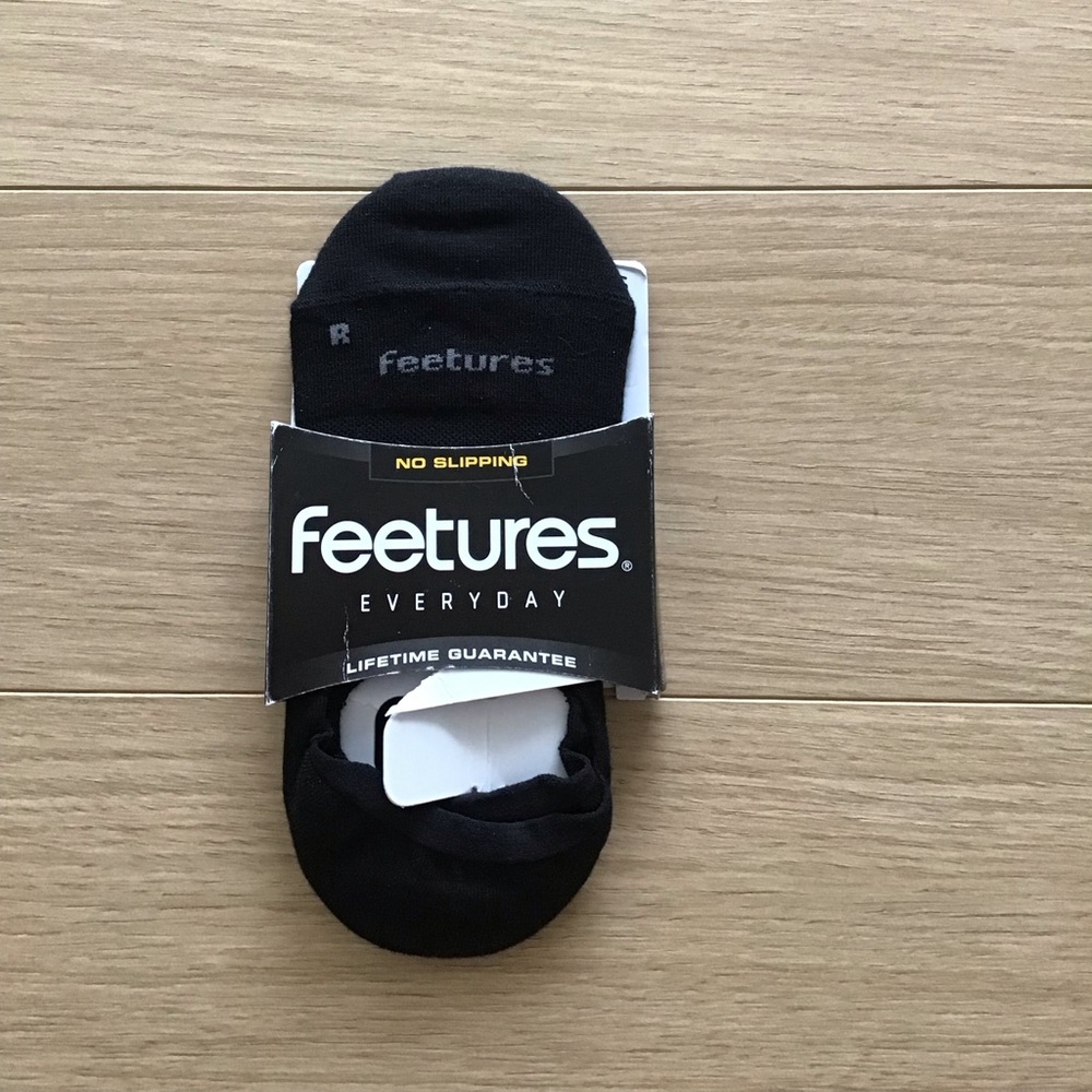 NEW Feetures black socks - only one pair size S